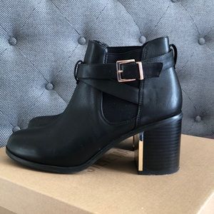 Ankle boots with gold detail